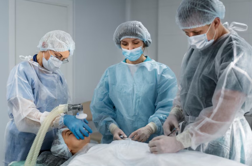 Hospitals across the Metro North Health Service (MNHS) region of Brisbane have resumed elective surgeries at noon today after a 48-hour suspension of category 2 and category 3 procedures. The pause&mdash;implemented earlier this week&mdash;was designed to relieve pressure on emergency departments facing high numbers of patients with influenza and COVID-19.

During the interruption, MNHS postponed 29 scheduled surgeries to free up staff and resources for urgent care. Importantly, category 1 surgeries&mdash;those considered urgent or time-sensitive&mdash;continued without interruption.

Queensland&rsquo;s Minister for Health and Ambulance Services, Tim Nicholls, expressed his gratitude to nursing and clinical teams for their tireless work throughout the surge. He emphasised that, though the state remains in the midst of what he termed a &ldquo;Queensland health crisis,&rdquo; there are positive signs: ambulance ramping times (the waits for ambulance-to-hospital handover) are trending downward, and the &ldquo;Surgery Connect Surge&rdquo; initiative has delivered the biggest drop in the elective surgery waiting-list in a decade.

In summary, the brief halt in non-urgent surgeries allowed Brisbane&rsquo;s public hospitals to temporarily shift resources toward managing a wave of flu and COVID patients. With the surge easing sufficiently, elective operations are now back on schedule&mdash;marking a positive shift in operational pressures across the region&rsquo;s public health network.

Additional Note: Accommodation for Patients and Carers

For patients and carers travelling to Brisbane for treatment, suitable accommodation options are available. Many hospitals list nearby lodging to support families attending treatment.

For example:


	The Queensland Health website outlines that hospitals &ldquo;provide information about local accommodation options on or near the hospital grounds.&rdquo;
	At St Andrew&rsquo;s War Memorial Hospital in Spring Hill, a list of partner hotels and serviced apartments offers &ldquo;patient and carer&rdquo; discounted rates&mdash;such as one studio suite from about A$168 per night.
	Nearby the&nbsp;Royal Brisbane and Women&rsquo;s Hospital&nbsp;and Royal Brisbane Hospital precinct, the Annexe Apartments in Herston advertise self-contained studio, one- and two-bedroom units complete with kitchen and laundry facilities for visiting patients and families.


These accommodation arrangements help families stay close to hospital facilities during treatment visits, surgeries or post-care stays&mdash;especially for regional or interstate patients.
