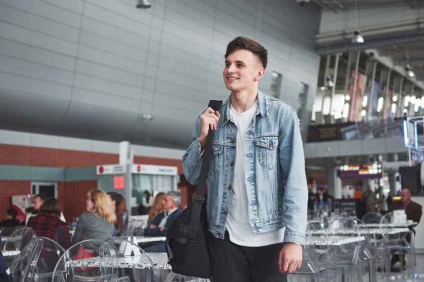 man in airport on peak season