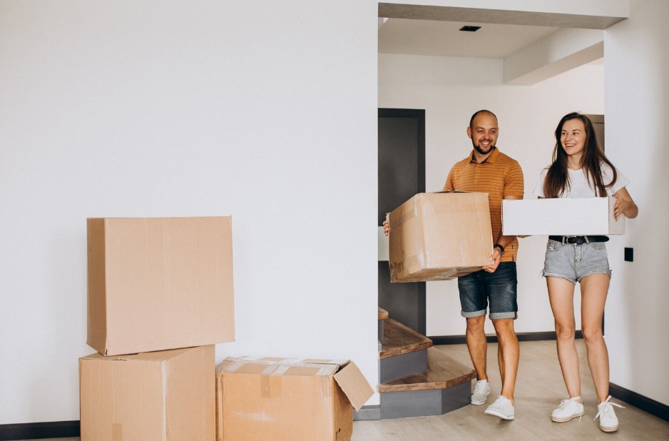 Young family moving into their new house