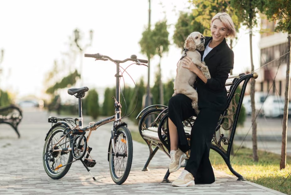 Pretty woman playing with her cute dog