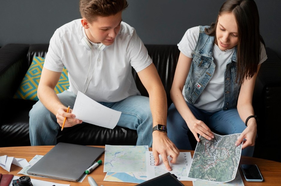 Medium shot people planning trip at home