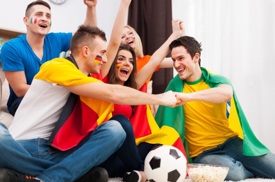 Friends of different nations supporting football team