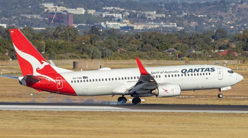 Qantas flight taking off from Perth airport