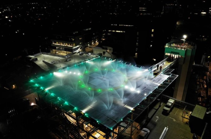 water and light display in helipad